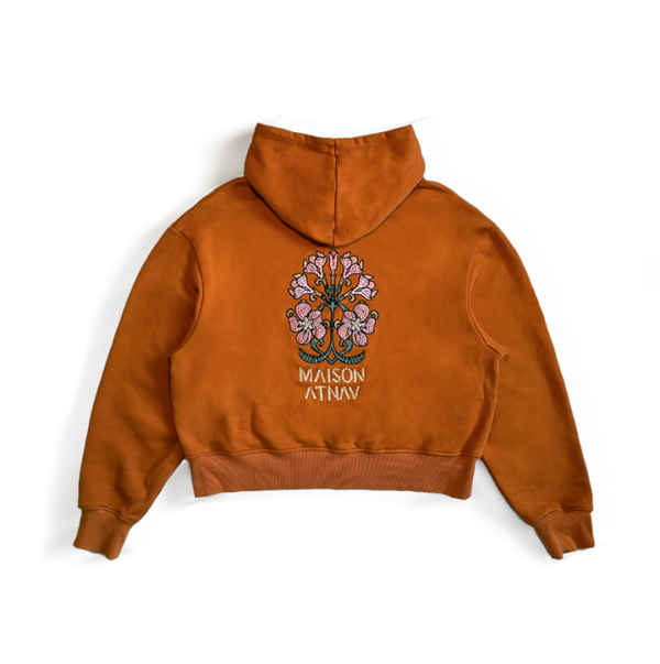 Le sweat à capuche boxy mosaïque